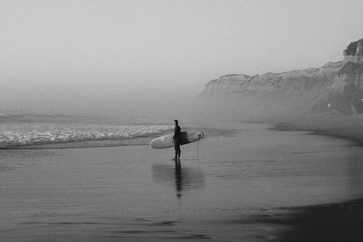 Surfer on the beach at Santa Cruz